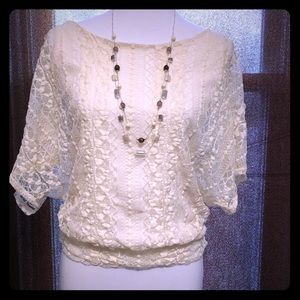 Lace top with attached underlay tank. NWT Sz Lg